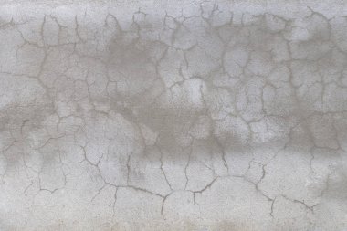 çatlak sıva gri çimento duvar dokulu ve benekli ışıklar ve d