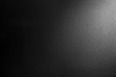 sağ üst corrner ışık kaynağı ile siyah koyu gri dokulu arka plan