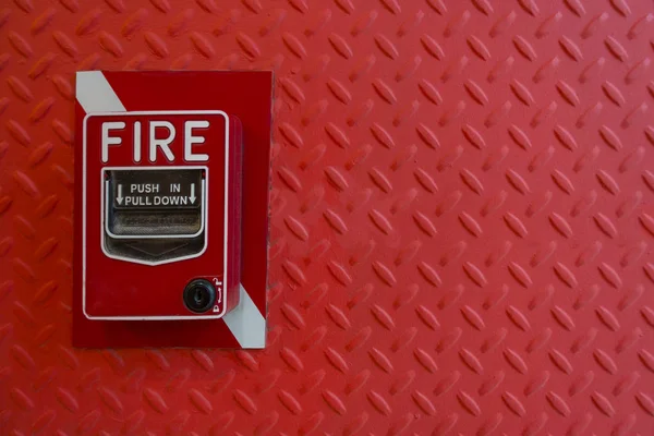 manual hand pull Fire alarm red red background