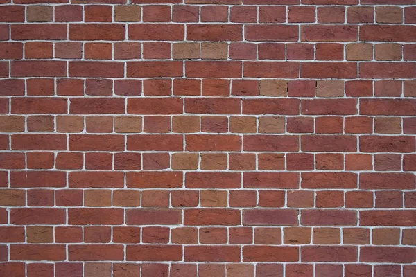 Parede de tijolo vermelho com juntas cimentadas — Fotografia de Stock