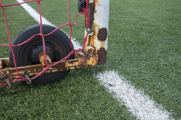 painted white boundary lines of a artficial plastic lawn