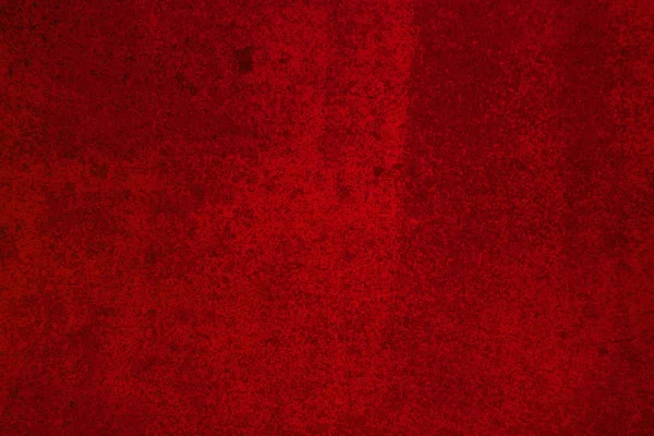 doku ve kum ile parlak kırmızı lekeli beton duvar yüzeyi