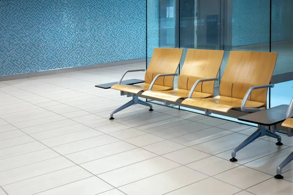 chairs in waiting room at a doctor's office hospital, or airport