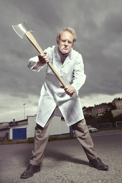 Older Paramedic Freak Man Medical Coat Threatening Double Axe — Stock Photo, Image