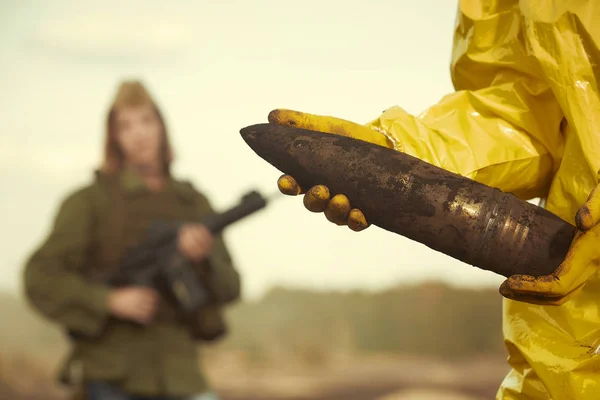 Specialist Chemical Protective Suit Holding Dangerous Artillery Grenade Field — Stock Photo, Image