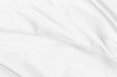 Pürüzsüz beyaz ipek kumaş ya da saten lüks kumaş dokusu düğün arka planı olarak kullanılabilir. Lüks ve soyut arzu için kumaşlar.