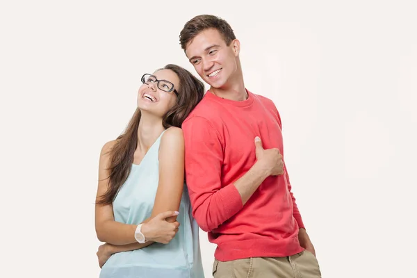 Feliz Casal Lindo Jovem Volta Para Trás Rindo Sobre Fundo — Fotografia de Stock