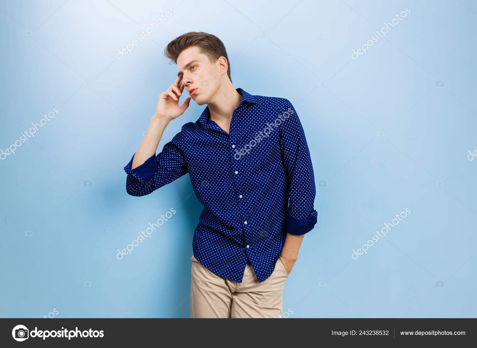 beige pants with blue shirt