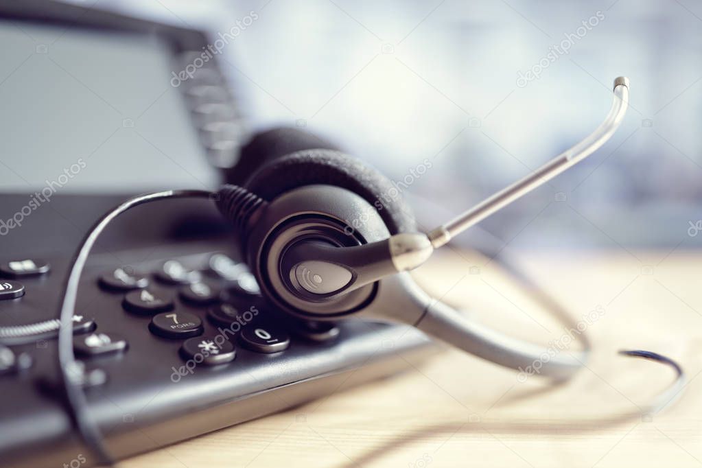 VOIP headset headphones and telephone concept for communication, it support, call center and customer service help desk