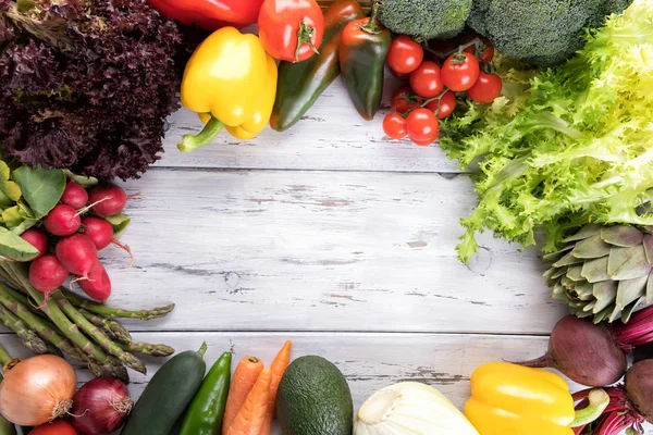 Organic food background. Food photography different vegetable on old light wooden background. Copy space. High resolution product — Stock Photo, Image