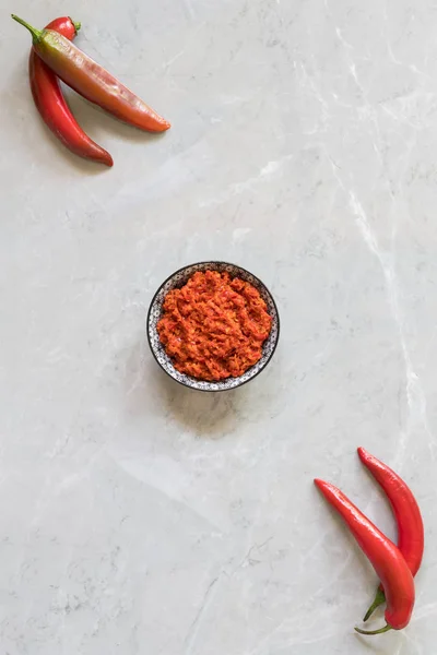 Traditional Maghrebi hot chili pepper sauce paste harissa. Tunisia and Arabic cuisine. Georgian adjika