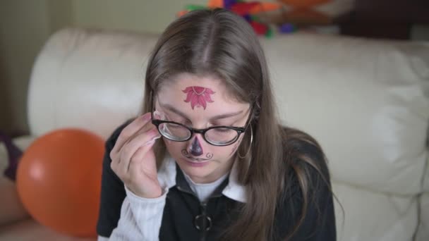 Girl Sticks Temporary Tattoo Her Face Simple Make Halloween Celebrating — Stock Video