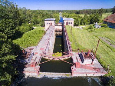 Giant concrete lock Piaski (Sandhof) in Guja - part of the Masurian Canal which was intended to connect the Great Masurian Lakes with the Baltic sea, Mazury, Poland (former East Prussia) clipart