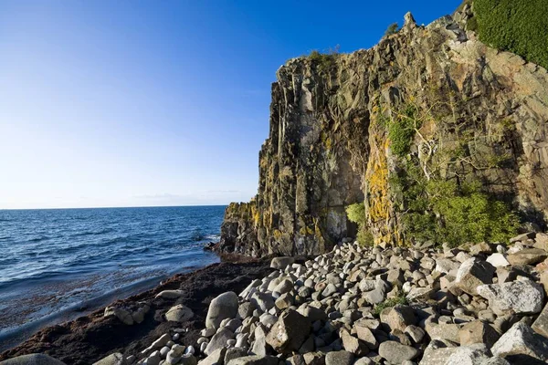 Sheer cliffs of the northern coast of Bornholm island - Jons Kapel (John\'s Chapel), Denmark