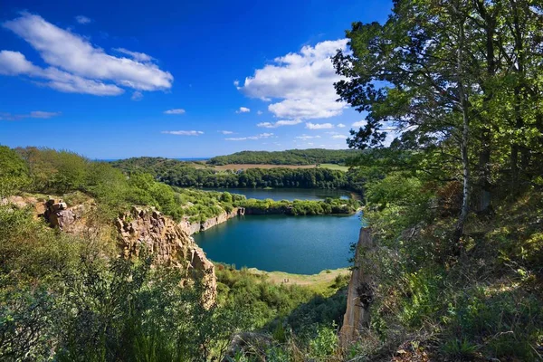 View of picturesque Opal (artificial lake formed in a granite quarry) and Hammer (the largest lake on the island, the only tarn in Denmark) lakes at the Northern tip of Bornholm, Denmark.