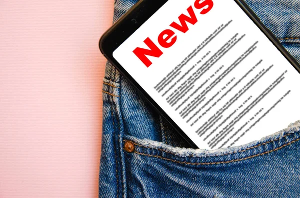 News Reading News Inscription Red News Smartphone Screen Lies Jeans — Stock Photo, Image
