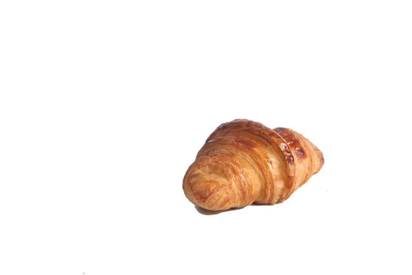 Croissant Isolerad Vit Bakgrund Horisontell Bild Bilden Innehåller Kopieringsutrymme — Stockfoto