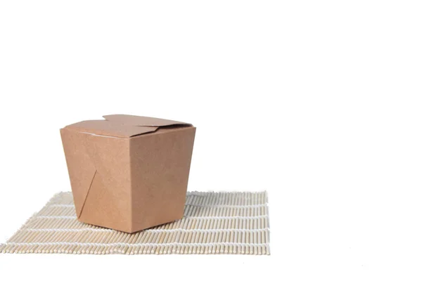 Wok Box Beyaz Arkaplanda Izole Edilmiş Bir Minder Üzerinde Resim — Stok fotoğraf