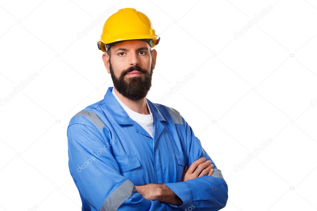 Builder in hard hat, foreman or repairman in the helmet. Bearded man worker with beard in building helmet or hard hat. Portrait architect builder, civil engineer working.