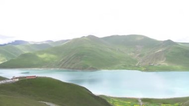 Yamdrok lake in Himalaya mountains. Yamdrok Lake is one of the three holy lakes in Tibet. China