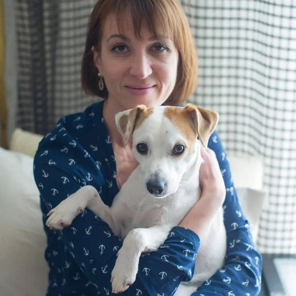 portrait of a woman with a pet, the age of 40 years