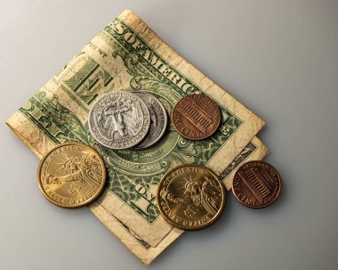 Bir Amerikan doları nakit ve bozuk para. İş konsepti.