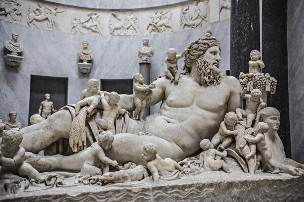 Antique Roman statues in Vatican Museum, Rome, Italy