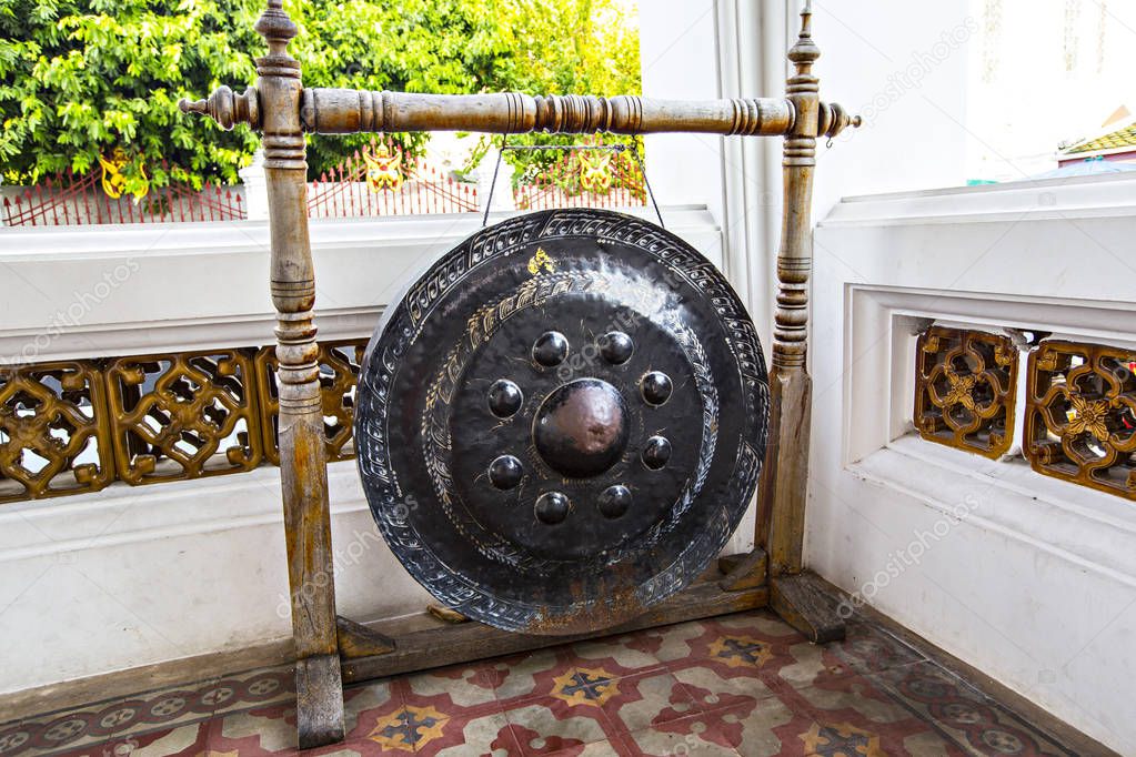 Temple Buddhist gong at the entrance of Wat Arun, Bangkok, Thailand