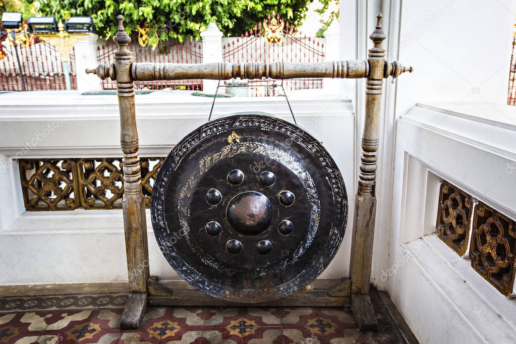 Temple Buddhist gong at the entrance of Wat Arun, Bangkok, Thailand