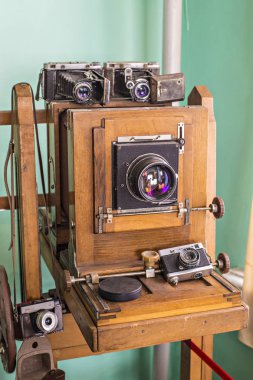  Old vintage big studio camera made of wood and metal on tripod, Kiev, Ukraine