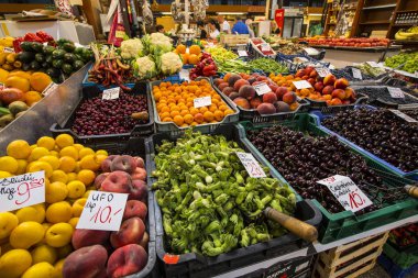 WROCLAW, POLAND - August 2019: Fruits, berries and vegetables on the Wrocaw Market Hall (Hala Targowa), Poland