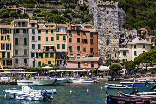 PORTO VENERE, ITALY - June 2019: Colorful houses of Porto Venere, Porto Venere, Liguria bay with old houses and boats, Italy