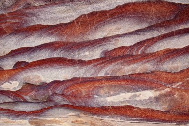 Kum taşı dokusu yakın. Kırmızı taş dokusu, Ürdün Çölü dağları, Petra, Wadi Rum Çölü, Ürdün