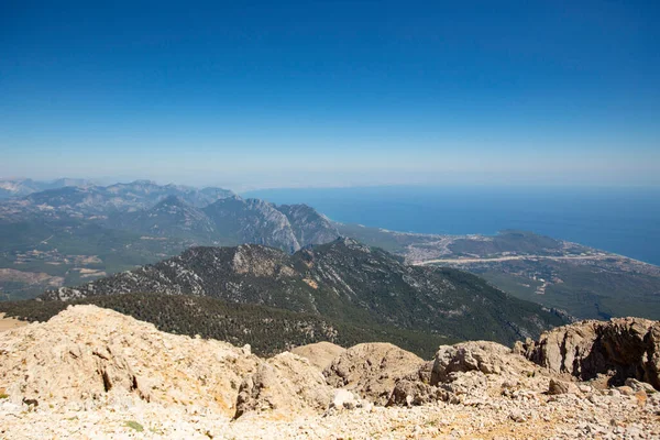 Mountains surrounded with blue sea, nature landscape