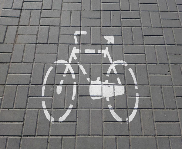 White Bicycle sign or icon on the road.