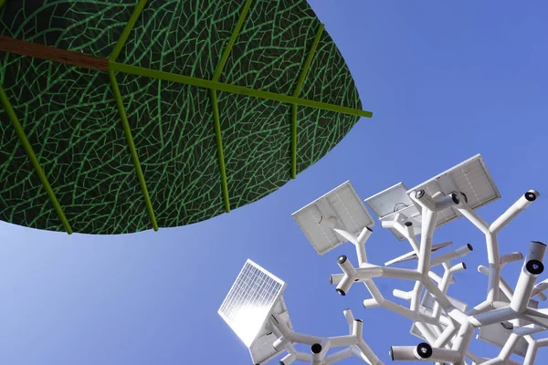 Smart charging solar panels tree and a man made giant green leaf.