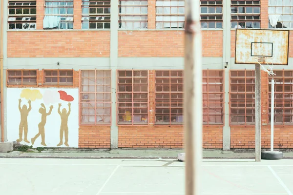 grunge school yard with basket court