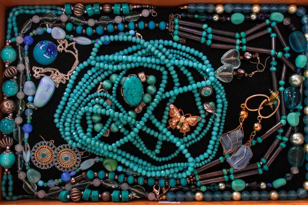 Female jewelry in blue and turquoise colors