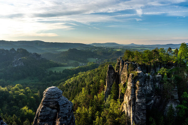 rocks in saxon switzerland at sunrise, germany