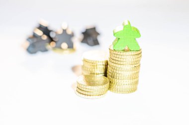 kazık üzerinde ahşap meeples ile gösterilen varlıkların eşit olmayan dağılımı