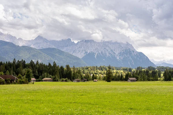 mountain panorama of the karwendel mountains with clouds in bavaria, germany