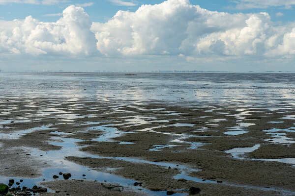 view on the wadden sea of the Northern sea at light life near emden, germany