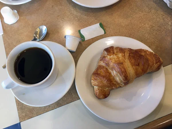 croissant, coffee in a dinner