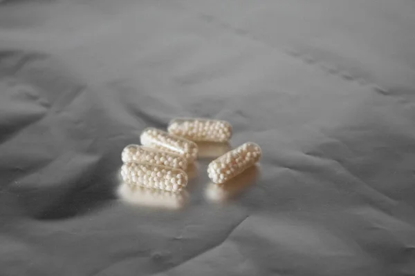 Pílulas de medicina branca — Fotografia de Stock