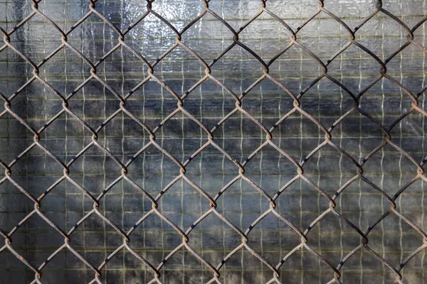 Background, texture from a metal lattice.