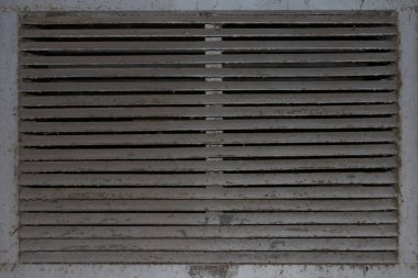 Eski bir terk edilmiş egzoz kaputu arka plan kafes.