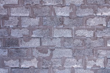 Yapım aşamasındaki bir binanın taş duvarının dokusu.