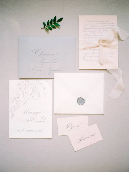 set of wedding calligraphy cards and ribbon