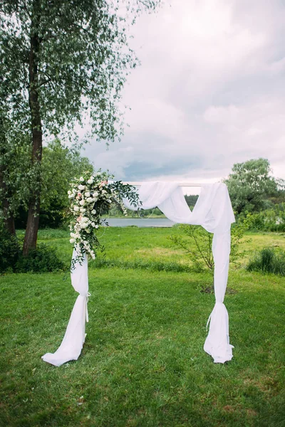 floral wedding decoration, arch of flowers outdoor