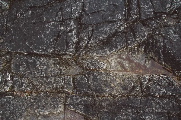 Textura de piedra abstracta de las olas erosionan, fondo de la naturaleza. Vista superior. Copiar espacio. Puede utilizar como banner . — Foto de Stock